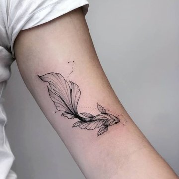 Tätowierung mit dem Sternzeichen Fische