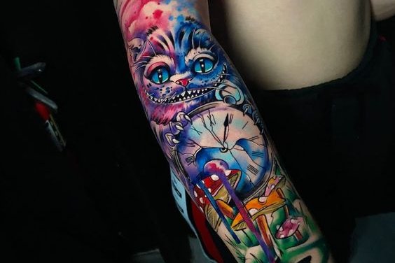 grinsekatze tattoo bedeutung