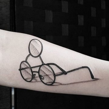 Brille Tattoo bedeutung