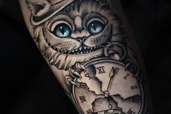 grinsekatze tattoo bedeutung