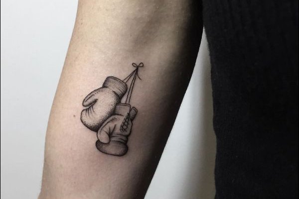 Boxhandschuh Tattoo Bedeutung