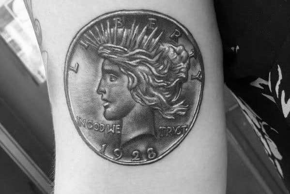 Münze Tattoo bedeutung