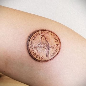 Münze Tattoo bedeutung