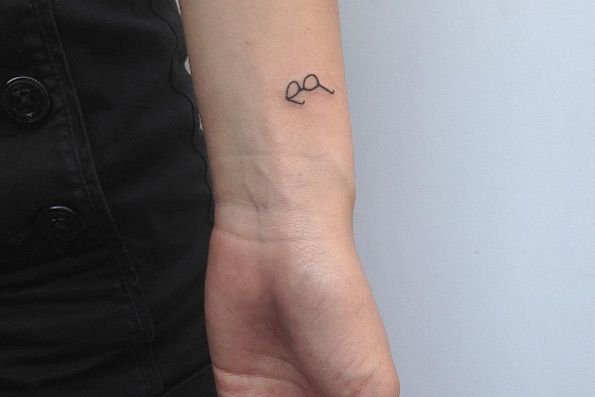 Brille Tattoo bedeutung