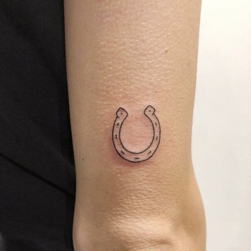 hufeisen tattoo bedeutung