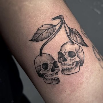 Frauenarm-Tattoos