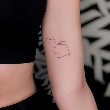 Frauenarm-Tattoos