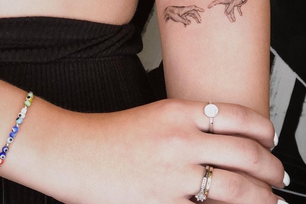 Frauenarm-Tattoos