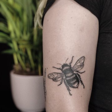 Frauenarm-Tattoos