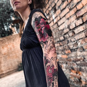 Frauenarm-Tattoos